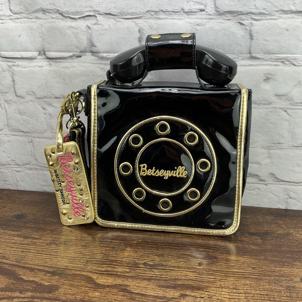 Betseyville Black and Gold Print Call Me Phone Wristlet